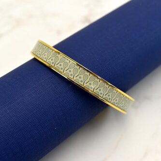 Racquet Inc Stylish Gold-Plated Tennis Bangle: Elegant Jewelry with a Sporty Twist